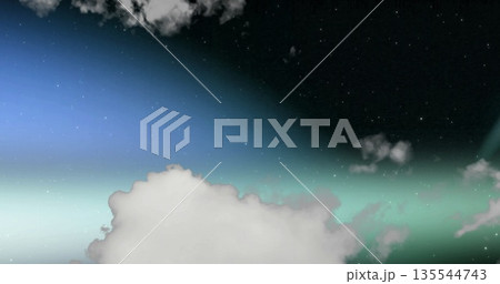 Showing twilight sky merging blue-green horizon into expanse, with fluffy clouds and distant stars Showing twilight sky merging blue-green horizon into expanse, with fluffy clouds and distant stars 135544743