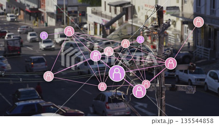 Displaying network graphic overlaying utility pole wires at street intersection, with moving cars Displaying network graphic overlaying utility pole wires at street intersection, with moving cars 135544858