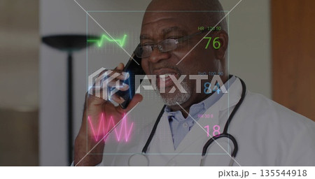 Making smartphone call, senior doctor wearing stethoscope projecting vital signs overlay in office Making smartphone call, senior doctor wearing stethoscope projecting vital signs overlay in office 135544918
