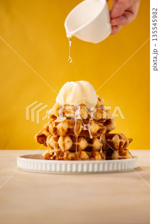 Stack of Belgian Waffles with Ice Cream and Syrup Stack of Belgian Waffles with Ice Cream and Syrup 135545982