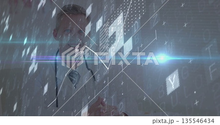 Doctor wearing coat and stethoscope studying hologram data overlay in clinical office, with charts 135546434