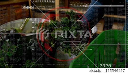 Reaching shopper wearing blue sweater selecting kale from wooden grocery table, with data overlay 135546467