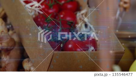 Showcasing crate of vine tomatoes on straw filler beside ginger at market, with digital overlay Showcasing crate of vine tomatoes on straw filler beside ginger at market, with digital overlay 135546477