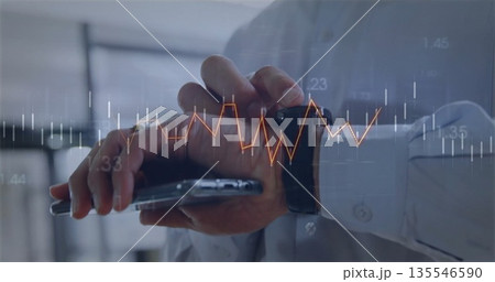 Tapping man in shirt interacting with smartwatch and smartphone in office showing financial chart Tapping man in shirt interacting with smartwatch and smartphone in office showing financial chart 135546590