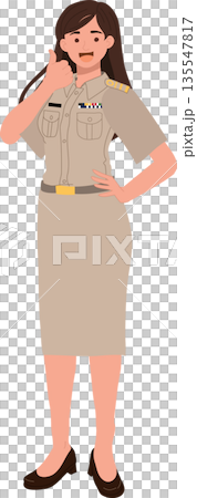 Asian female civil servant in Thai government uniform showing positive gesture in a professional environment. 135547817