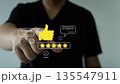 Customer Feedback and Satisfaction Rating Concept with Five Star Review and Thumbs Up 135547911