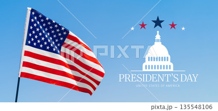 Celebration of Presidents Day with American flag and Capitol building against blue sky 135548106