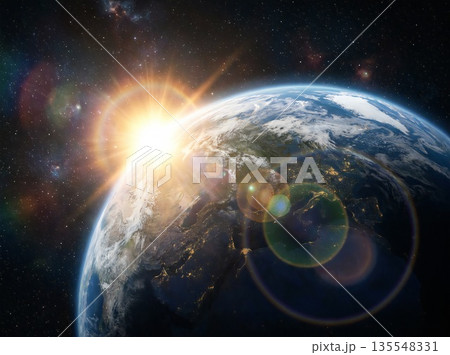 宇宙から見た地球と昇る太陽、朝日 135548331
