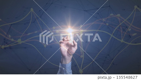 Touching hand in blue shirt reaching toward glowing node in virtual interface, with network overlay Touching hand in blue shirt reaching toward glowing node in virtual interface, with network overlay 135548627