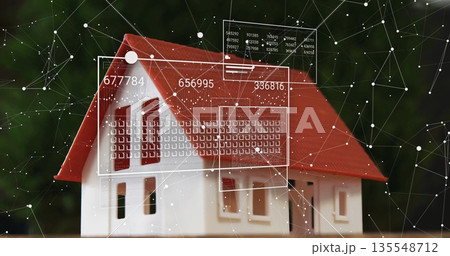 Showing miniature house model sitting on flat plane in garden, with digital panels displaying data Showing miniature house model sitting on flat plane in garden, with digital panels displaying data 135548712