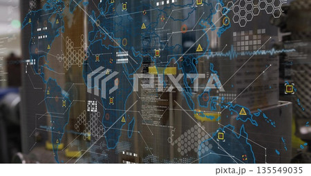 Showing digital world map on control room glass, with hexagon clusters, icons, shelving and boxes 135549035