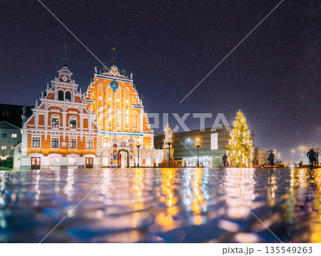 Riga, Latvia. Town Hall Square, Popular Place With Famous Landmarks On It In Night Illumination In Winter Twilight. Winter New Year Christmas Holiday Season 135549263