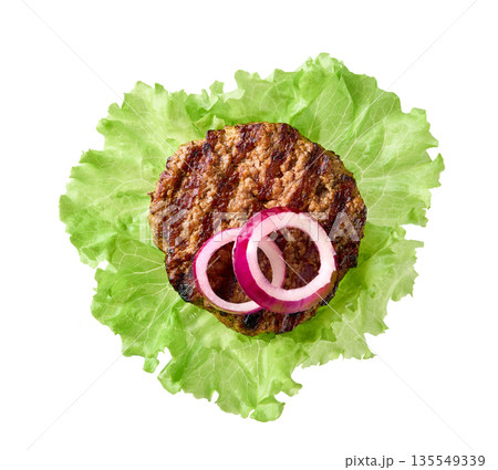 grilled hamburger beef patty with fresh lettuce leaves isolated on white background, top view. grilled hamburger beef patty with fresh lettuce leaves isolated on white background, top view. 135549339