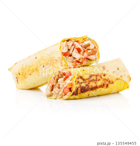 Delicious street food wrap with meat and vegetables on a white background 135549455