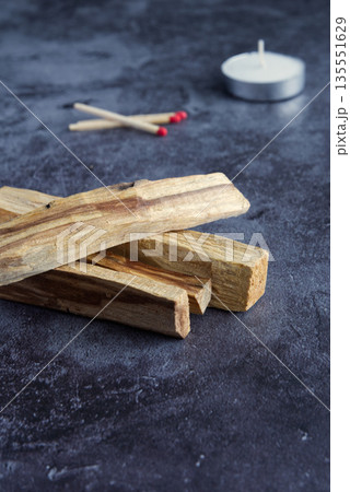 Palo santo wood on a dark background Palo santo wood on a dark background 135551629