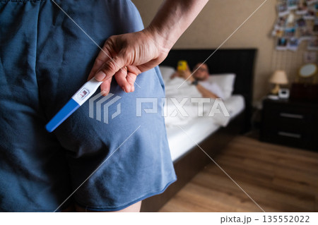 Positive Pregnancy Test Hidden Behind Back 135552022
