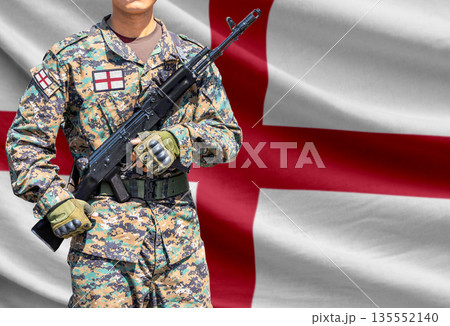 Saint George flag with soldier holding assault rifle 135552140