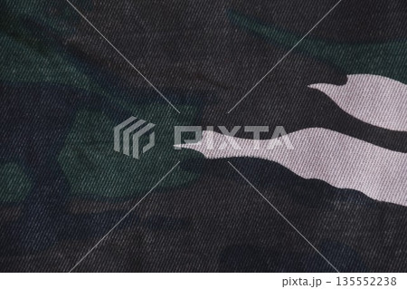 black and white military camouflage on fabric texture and background 135552238
