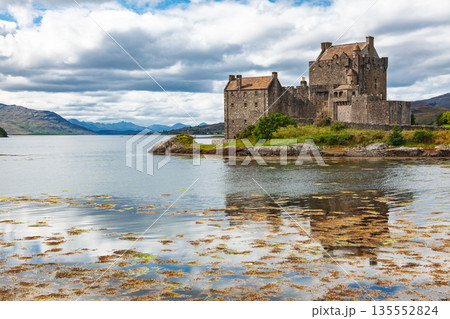 Eilean Donan Castle and stone bridge at low tide Scotland Eilean Donan Castle and stone bridge at low tide Scotland 135552824