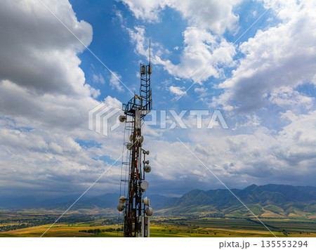 Communications tower and antennas in rural landscape Communications tower and antennas in rural landscape 135553294