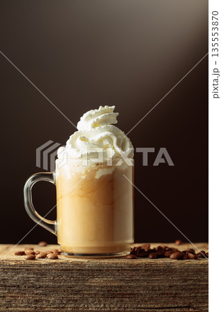 Coffee with whipped cream. Coffee with whipped cream. 135553870