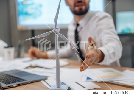 Man is working in the wind turbine company 135556303