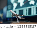 Close up focused view of toy plane on desk in airline company 135556587
