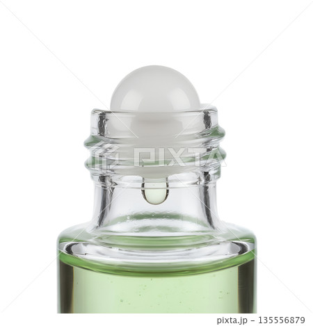 Close-up of a glass roll-on bottle filled with a natural green liquid, isolated on a transparent background. Ideal for essential oils and wellness Close-up of a glass roll-on bottle filled with a natural green liquid, isolated on a transparent background. Ideal for essential oils and wellness 135556879