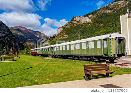 Old wagons in the old train station of Canfranc in the Pyrenees in Huesca, Spain close to the border with France. Old wagons in the old train station of Canfranc in the Pyrenees in Huesca, Spain close to the border with France. 135557963