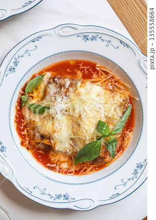 Classic lasagna with tomato sauce and cheese Classic lasagna with tomato sauce and cheese 135558664