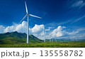 Turbines wind farm on green hills of clean energy and a sustainable future. 135558782