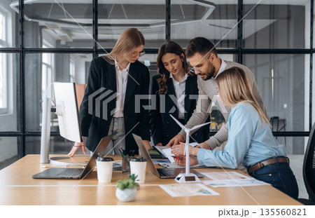 Active discussion. Business people are working in the office Active discussion. Business people are working in the office 135560821