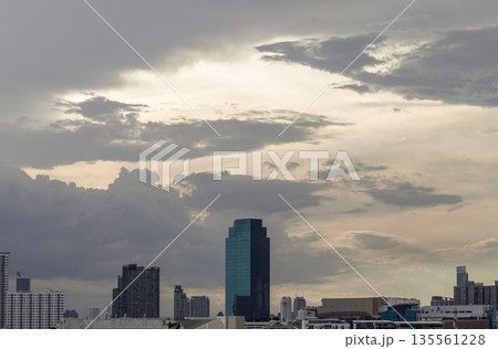 Architecture exterior of Modern high-rise buildings of Dramatic sky in the city of Bangkok. 135561228