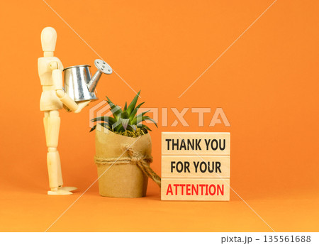 Thank you for your attention symbol. Concept words Thank you for your attention on beautiful wooden blocks. Beautiful orange background. Business thank you for your attention concept. Copy space. 135561688