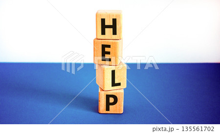 Help symbol. Concept word Help on beautiful wooden blocks. Beautiful white and blue background. Business, lifestyle, support and help concept. Copy space. Help symbol. Concept word Help on beautiful wooden blocks. Beautiful white and blue background. Business, lifestyle, support and help concept. Copy space. 135561702
