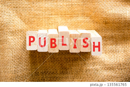Publish word symbol. Concept word Publish on beautiful wooden blocks. Beautiful canvas background. Business publish word concept. Copy space. Publish word symbol. Concept word Publish on beautiful wooden blocks. Beautiful canvas background. Business publish word concept. Copy space. 135561765