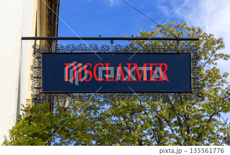 Disclaimer symbol. Concept word Disclaimer on beautiful black road sign. Beautiful blue sky and street in Brugge background. Business disclaimer concept. Copy space. 135561776