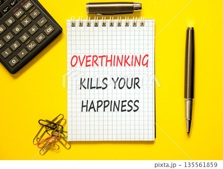 Overthinking kills your happiness symbol. Concept words Overthinking kills your happiness on note. Beautiful yellow background. Black pen. Business overthinking kills happiness concept. Copy space. Overthinking kills your happiness symbol. Concept words Overthinking kills your happiness on note. Beautiful yellow background. Black pen. Business overthinking kills happiness concept. Copy space. 135561859