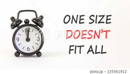 One size does not fit all symbol. Concept words One size does not fit all on beautiful white paper. Beautiful white background. Alarm clock. Business one size does not fit all concept. Copy space. 135561912
