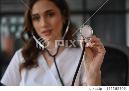 Professional stethoscope. Woman doctor is in the office 135562306
