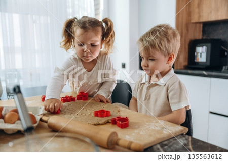 Kids are preparing bakery at home 135563612