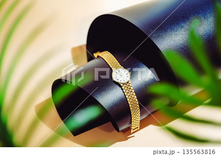 Golden wrist watch 135563816