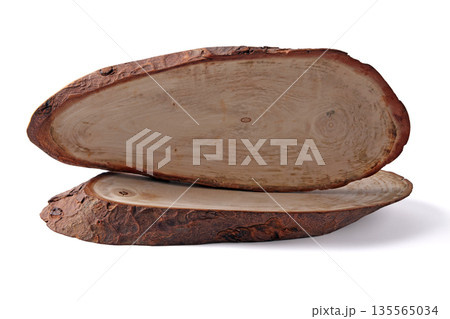 A podium for advertising a product made of two wood cuts isolated on a white background. A podium for advertising a product made of two wood cuts isolated on a white background. 135565034