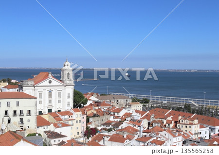 Panoramic view of Alfama district and Tagus River in Lisbon, Portugal Panoramic view of Alfama district and Tagus River in Lisbon, Portugal 135565258