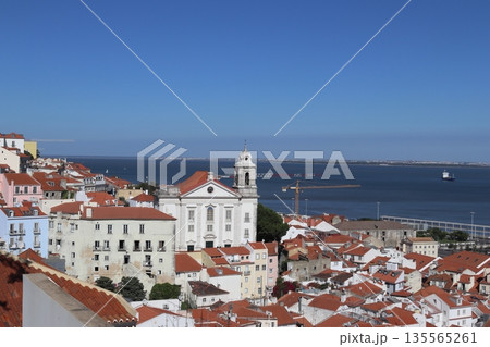 Panoramic view of Alfama district and Tagus River in Lisbon, Portugal 135565261