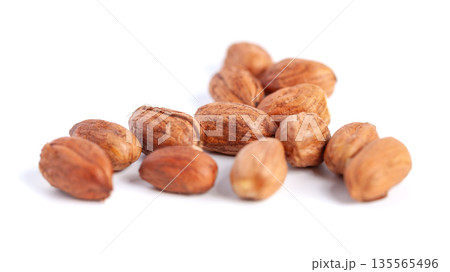 Hazelnuts kernels on a white background, healthy food. Macro 135565496