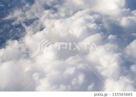 Aerial cloudscape view covered with cloud. Aerial cloudy sky view. Cloud view from plane. Sky in cloud. Cloudscape with cloudy weather. Cloud and cloudscape aerial sky Aerial cloudscape view covered with cloud. Aerial cloudy sky view. Cloud view from plane. Sky in cloud. Cloudscape with cloudy weather. Cloud and cloudscape aerial sky 135565665