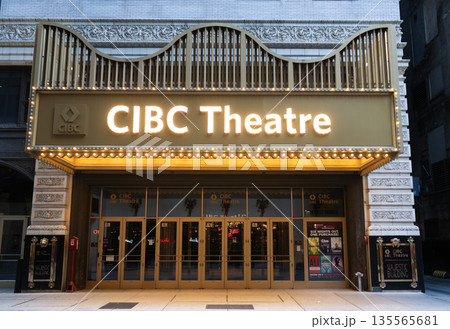 Chicago, Illinois, USA - October 22, 2024: Empty street of Chicago. CIBC Theatre. Performing arts CIBC theatre light sign entrance at downtown. View of the CIBC Theatre in Chicago 135565681