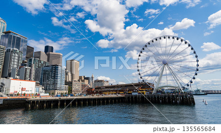 Seattle, Washington, USA, July 26, 2024: Amusement park with Ferris wheel. Observation Ferris wheel. Fairground ride on observation wheel. Entertainment sightseeing. Copy space. Ferris wheel Seattle, Washington, USA, July 26, 2024: Amusement park with Ferris wheel. Observation Ferris wheel. Fairground ride on observation wheel. Entertainment sightseeing. Copy space. Ferris wheel 135565684