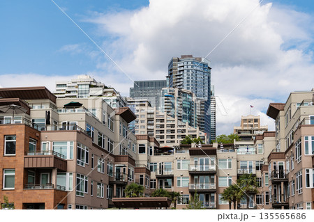 Skyscraper in city downtown. City skyline architecture. Office building in business district. Residential building. Skyscraper building architecture. Skyscraper cityscape skyline. Urban cityscape 135565686